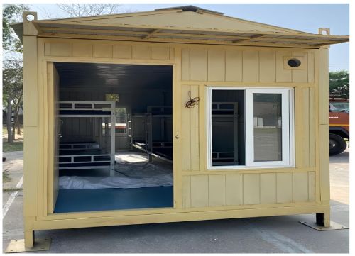 Collapsible modular container shelter with window and door for portable site accommodation