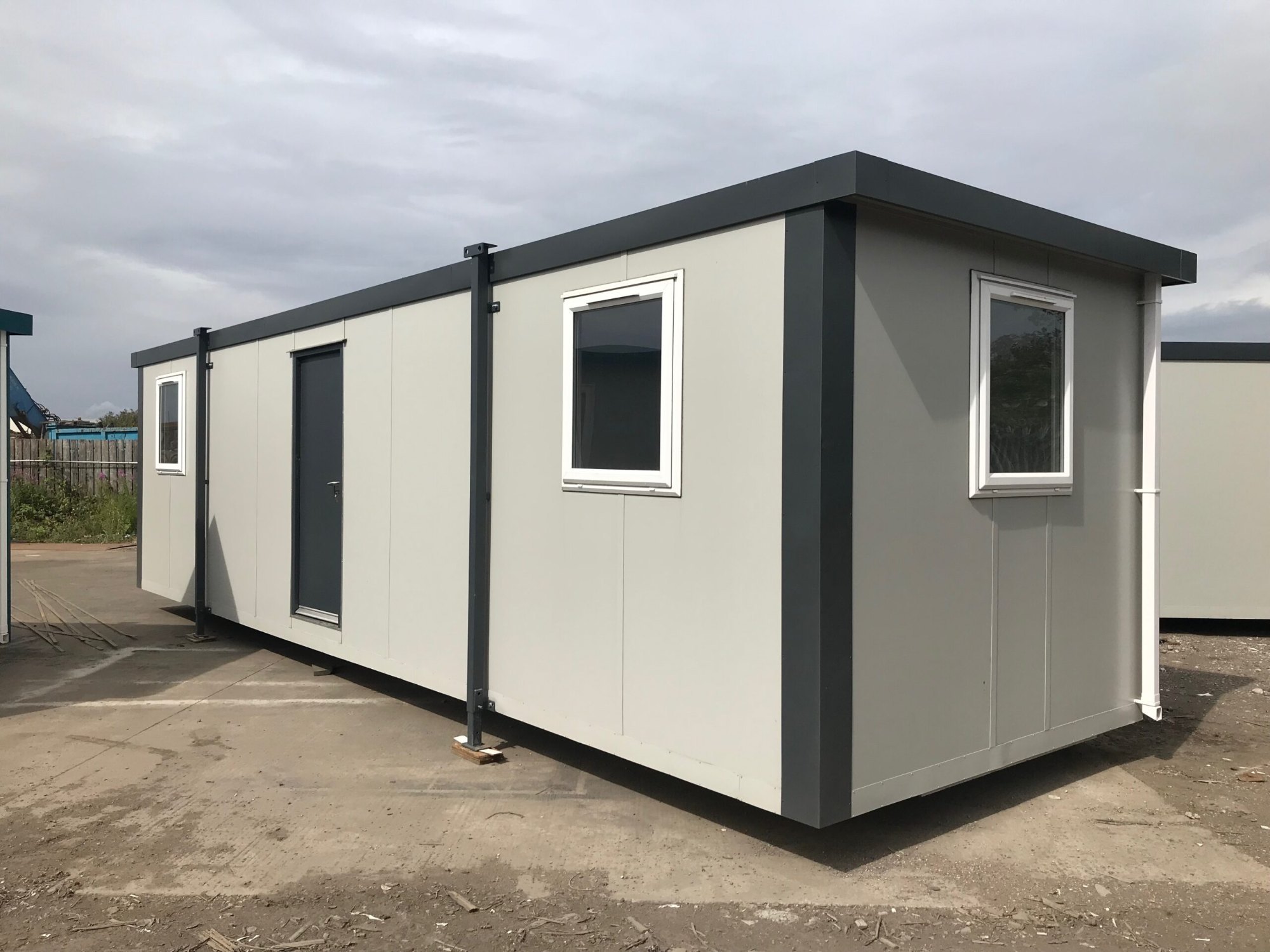 Modular portable office cabin container with door and windows for site office use